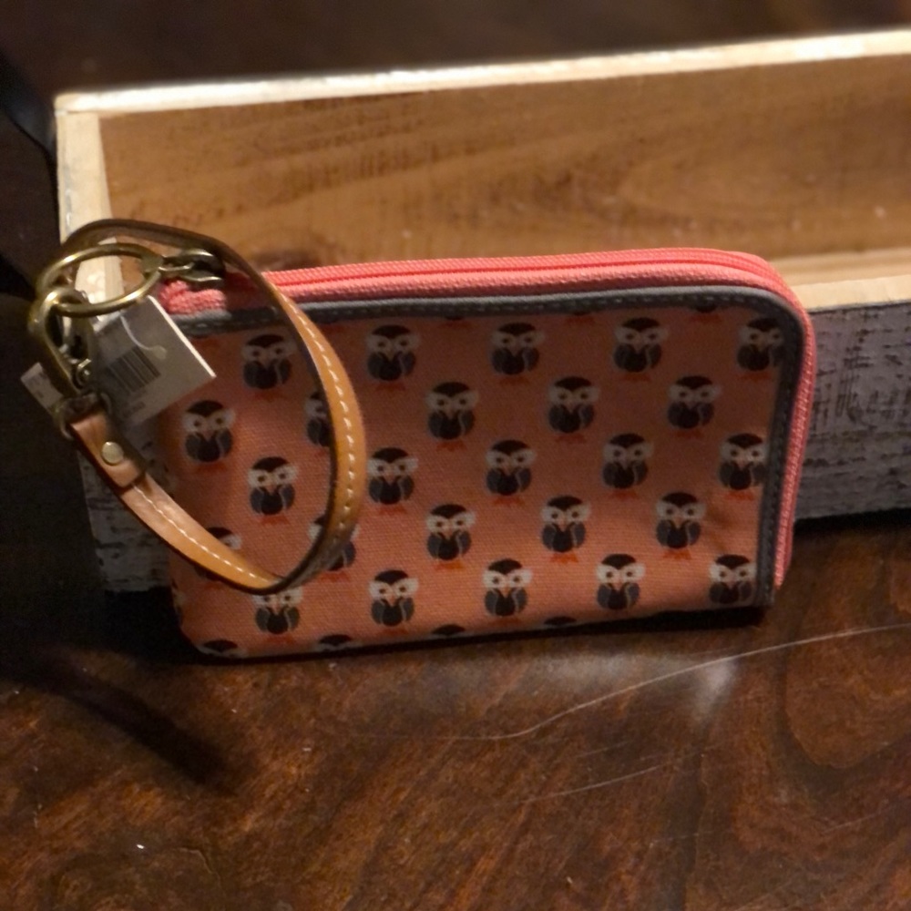 Fossil owl print wristlet